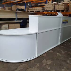 used large White Reception Desk, front view