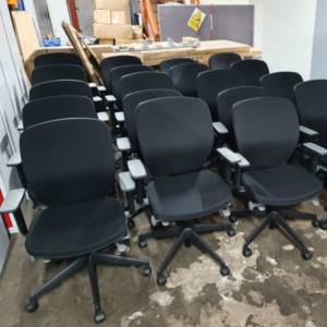 As new condition, Orangebox Joy Chairs in black fabric with height adjustable arms. 