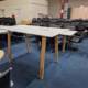 used cable managed standing table with wooden legs 2