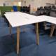 used cable managed standing table with wooden legs