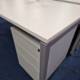 steel mobile pedestal close view with desk