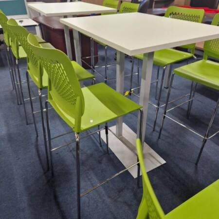 pre-owned high tables shown with green bar stools