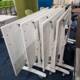 used white flip top tables with power set of 5