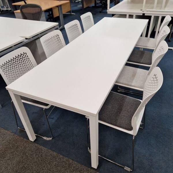 used white meeting table and chairs close up 5