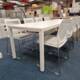 used white meeting table and chairs close up